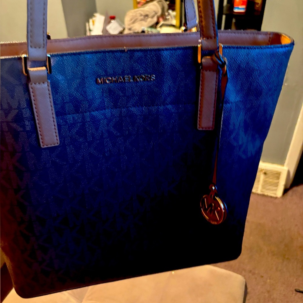Michael Kors brown & tan with matching belt. Gently used..